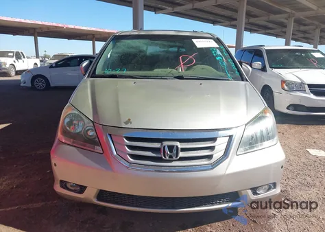 2009 Honda Odyssey Touring z USA, uszkodzony, nr VIN 5FNRL38819B021352